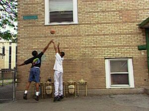 hoop dreams cinematography by peter gilbert day medium shot over the shoulder backlight sunny shot 067