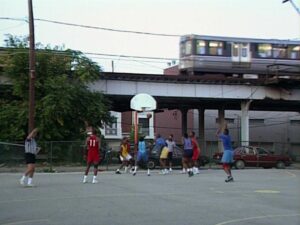 hoop dreams cinematography by peter gilbert day wide shot three shot backlight sunny car shot 012