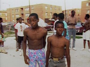 hoop dreams cinematography by peter gilbert exterior day medium close up three shot backlight sunny shot 035