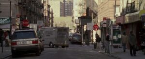 lucky number slevin cinematography by peter sova exterior day wide shot three shot backlight truck shot 036