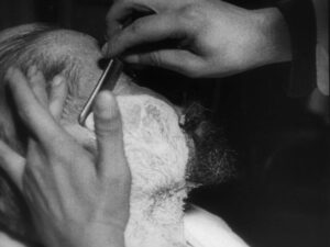 man with a movie camera cinematography by mikhail kaufman day extreme close up side lighting daylight shot 062