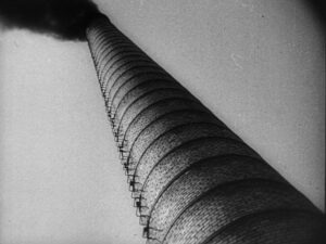 man with a movie camera cinematography by mikhail kaufman day extreme close up side lighting sunny shot 053