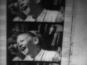 man with a movie camera cinematography by mikhail kaufman day medium close up side lighting daylight shot 067