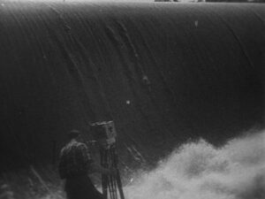 man with a movie camera cinematography by mikhail kaufman day medium wide shot backlight shot 059