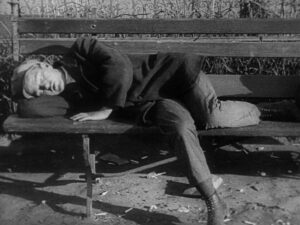 man with a movie camera cinematography by mikhail kaufman exterior day establishing shot hard light shot 038