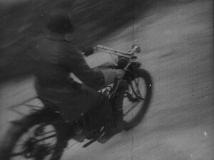 man with a movie camera cinematography by mikhail kaufman exterior day establishing shot side lighting shot 034