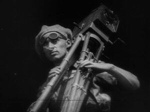 man with a movie camera cinematography by mikhail kaufman night establishing shot silhouette artificial light shot 036