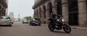 mission impossible fallout cinematography by rob hardy exterior day medium wide shot backlight daylight motorcycle shot 021