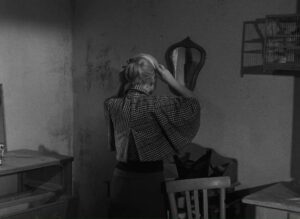 nights of cabiria cinematography by lotello martelli interior day medium close up backlight shot 052