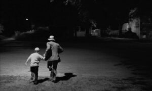 paper moon cinematography by l szl kov cs night medium wide shot two shot silhouette artificial light shot 013
