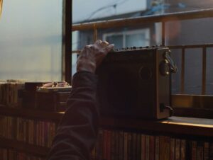 perfect days cinematography by franz lustig day medium close up backlight shot 050