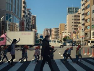 perfect days cinematography by franz lustig exterior day medium wide shot three shot backlight daylight car shot 037