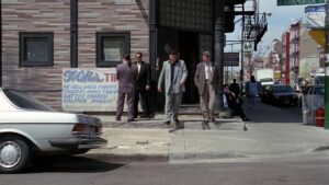 primal fear cinematography by gregory hoblit exterior day medium wide shot three shot backlight daylight car shot 039