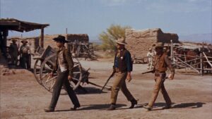 rio bravo cinematography by russell harlan exterior day medium shot three shot backlight daylight shot 002