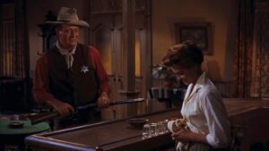 rio bravo cinematography by russell harlan night medium close up two shot artificial light shot 020