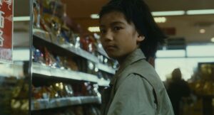 shoplifters cinematography by ry to kond day close up over the shoulder hard light fluorescent shot 005