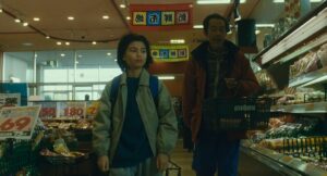 shoplifters cinematography by ry to kond day medium close up two shot backlight fluorescent shot 003