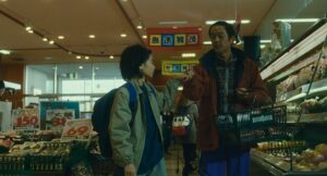 shoplifters cinematography by ry to kond day medium close up two shot backlight fluorescent shot 004
