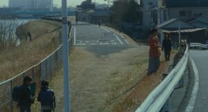 shoplifters cinematography by ry to kond exterior day wide shot three shot backlight overcast shot 049