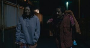 shoplifters cinematography by ry to kond exterior night close up two shot artificial light shot 027