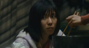 shoplifters cinematography by ry to kond extreme close up artificial light shot 065