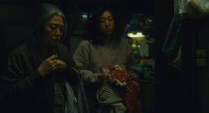 shoplifters cinematography by ry to kond interior night close up two shot artificial light shot 033