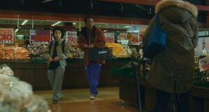 shoplifters cinematography by ry to kond medium close up three shot fluorescent shot 002