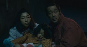shoplifters cinematography by ry to kond night close up artificial light shot 029