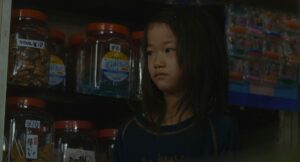 shoplifters cinematography by ry to kond night close up artificial light shot 054