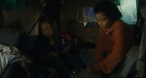 shoplifters cinematography by ry to kond night close up two shot artificial light shot 061