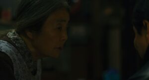 shoplifters cinematography by ry to kond night extreme close up artificial light shot 047