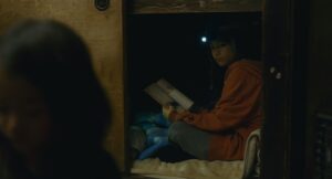shoplifters cinematography by ry to kond night medium close up artificial light shot 042