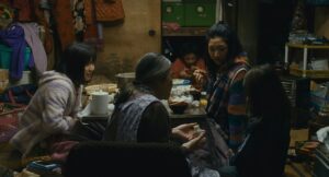 shoplifters cinematography by ry to kond night medium close up over the shoulder artificial light shot 069