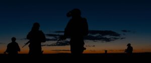 sicario cinematography by roger deakins exterior night medium shot three shot artificial light shot 006