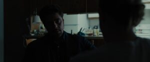 sicario cinematography by roger deakins interior night extreme close up two shot silhouette fluorescent shot 071