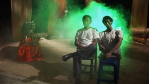 the act of killing cinematography by lars skree day medium shot two shot hard light shot 018