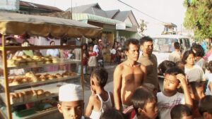 the act of killing cinematography by lars skree exterior day medium shot three shot backlight sunny shot 032