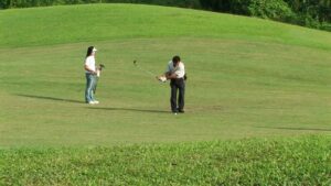 the act of killing cinematography by lars skree exterior day wide shot two shot overcast shot 041