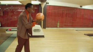 the act of killing cinematography by lars skree interior day medium close up backlight sunny shot 043