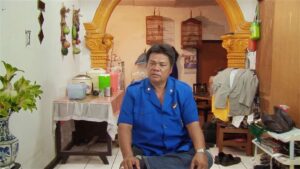 the act of killing cinematography by lars skree interior day medium close up backlight sunny shot 071