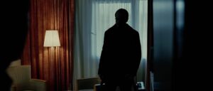 the bourne supremacy cinematography by oliver wood interior medium close up silhouette practical light shot 033