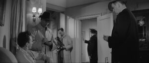 the hustler cinematography by eugen sch day medium close up three shot shot 037