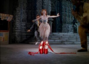 the red shoes cinematography by jack cardiff medium close up three shot shot 050