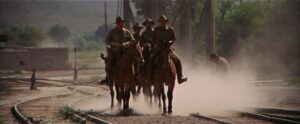 the wild bunch cinematography by lucien ballard day medium wide shot two shot backlight daylight shot 011