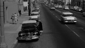 what ever happened to baby jane cinematography by ernest haller exterior day wide shot three shot car shot 030